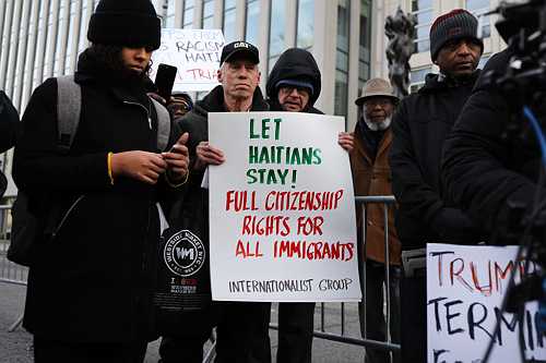 Biden grants temporary protected status to Haitian immigrants - TheGrio